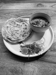 Chettinadu Mushroom Curry With Parotta