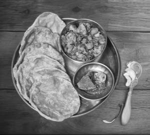 Fried Aloo With 6 Poori And Pickle