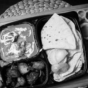 Roti With Chicken Butter Masala And Pork Dry Fry