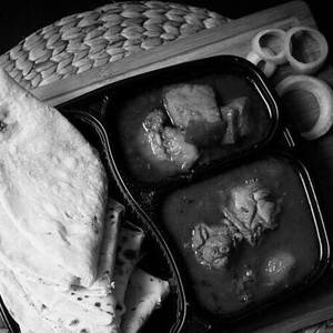 Roti With Chicken And Pork Curry