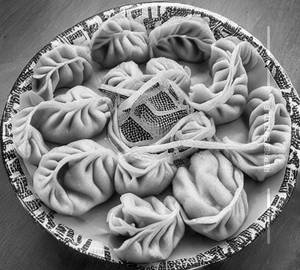 Gravey paneer momos