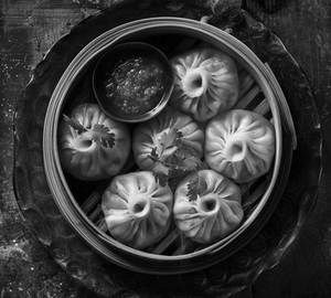 Chicken steamed momos [8 pieces]