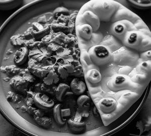 Mushroom Masala(Half)+ Butter Naan 2Pcs