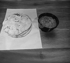 Roti [4] & Bihari Chicken Curry [2 Pieces]