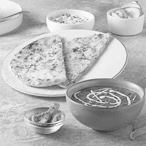Aloo Kulcha With Dal Makhani & Raita
