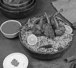 Hyderabadi Chicken Lollipop Biryani With Dessert.