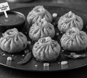 Paneer Schezwan Sauce Momos