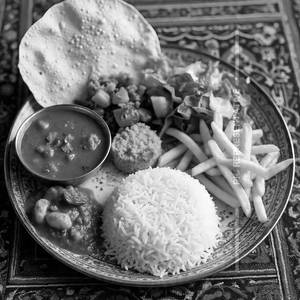Steam Rice, Egg Cury, Plain Dal, Mixed Veg, Papad, French Fry, Salad