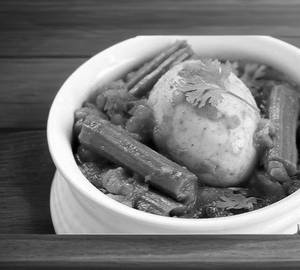 Drumsticks with egg curry