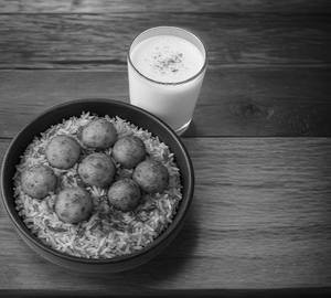 Dum Allo Biryani (400Ml) + Butter Milk