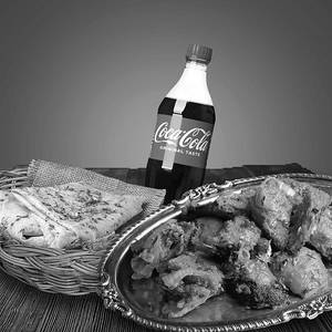 Kake Di Tandoori Chaap + 2 Rumali Roti + Coke