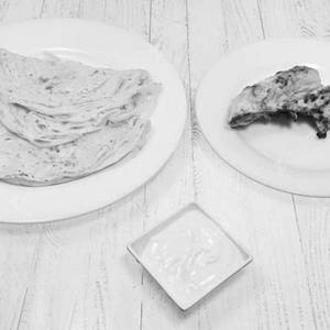 Quarter Afghan Chicken + 2 Kubz/2 K Parota /2 Chapathi+ Maynz+salad