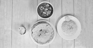 1 Chola Paneer + 4 Roti + 1 Rice + Salad + Aachar