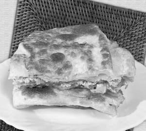 Stuffed egg porotta