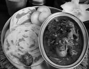 Parotta With Chicken Masala