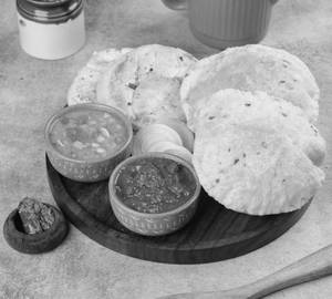 Chole Bhature (2 Pcs) + Kulcha (2 Pcs)                           