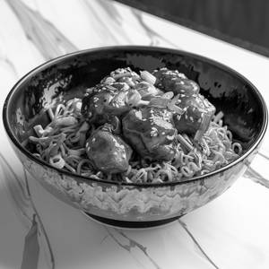 Schezwan Noodles With Chicken Manchurian