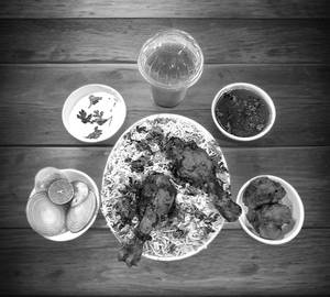 Dum Biryani 500ml+Chicken Kebab 2 Pieces+Raita+Salad+1 Buttermilk