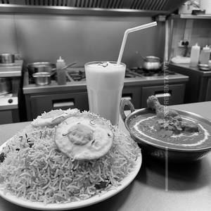Egg Biryani + Butter Chicken Masala + Special Sharjay Milkshake Combo