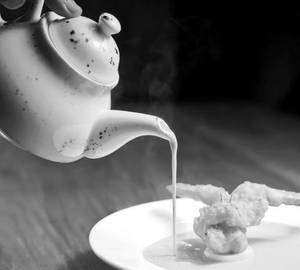 Crispy Jhinga Tempura In A Curry Leaf Lemongrass Broth