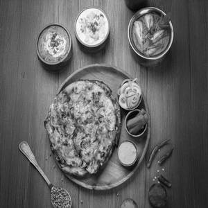 Aaloo Naan+ Dal Makhni+ Shahi Paneer+ Raita
