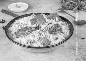 Chicken Handi Dum Biryani + Curd Combo