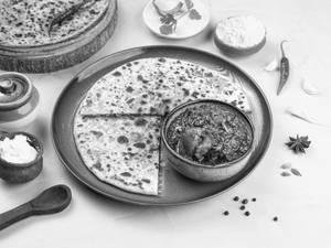 Sattu Paratha With Chicken Curry