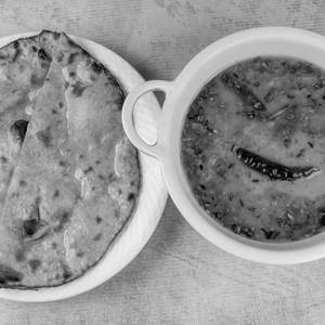 Dal Tadka With 2 Tava Chapati