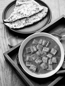 Butter Naan 2 Nos + Paneer Butter Masala