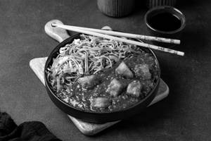 Veg Noodles With Paneer Manchurian Gravy
