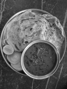 Kerala Style Paratha with chicken Gassi