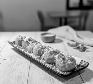 Kurkure Cheese Topped & Tossed Veg Momo                                                      