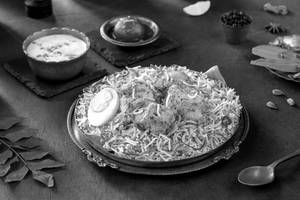 Murgh-e-narm (chicken Dum Hyderabadi Boneless Biryani-serve-1)
