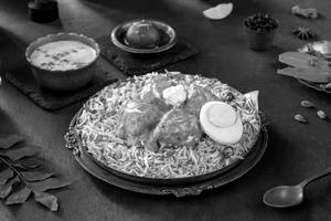 Makhan Murgh (butter Chicken Boneless Hyderabadi Biryani-serve-1)
