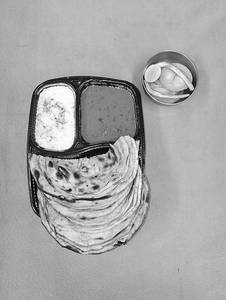 Dal Makhani + Choice Of Bread + Masala Dahi + Salad