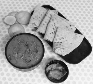 Dal Fry with 4 Butter Chapati
