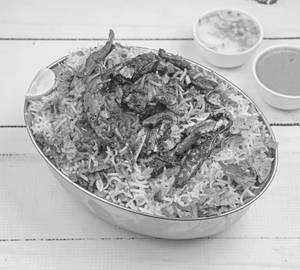 Fish & Prawn Biryani In Banana Leaf