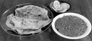 Kerala Parotta + Green Piece Curry + Salad Combo