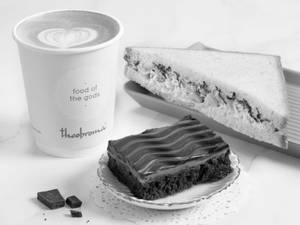 Choice of Beverage + Eggless Brownie + Veg Sandwich/Savoury