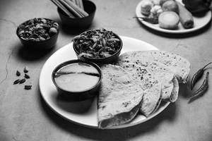 Aloo Bhujia (seasonal)+yellow Dal (200ml)+roti (4 Pcs)