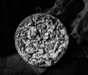 One Bite Paneer Peppery Pizza
