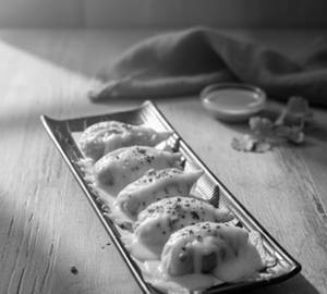Melted Cheese Topped Fried Chicken Momo    