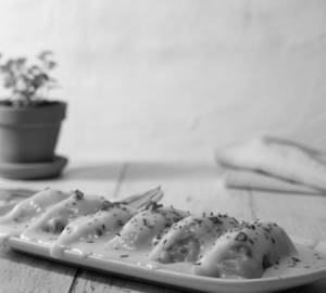 Melted Cheese Topped Steamed Chicken Momo                