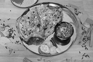 Chur Chur Naan Served With Kadhai Paneer