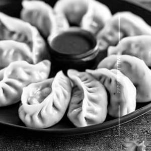 White sauce baked momo