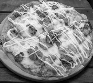 Schezwan chicken pizza