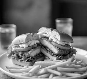 Chicken cheese burger with peri peri fries