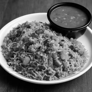Veg Hyderabadi Briyani (With Gravy)