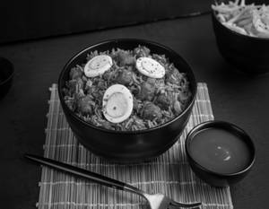 Boiled Egg Schezwan Chicken Fried Rice