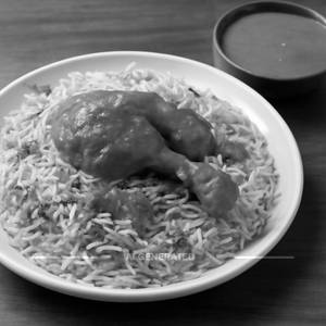Chicken Biryani With Half Raita & Gravy                                    